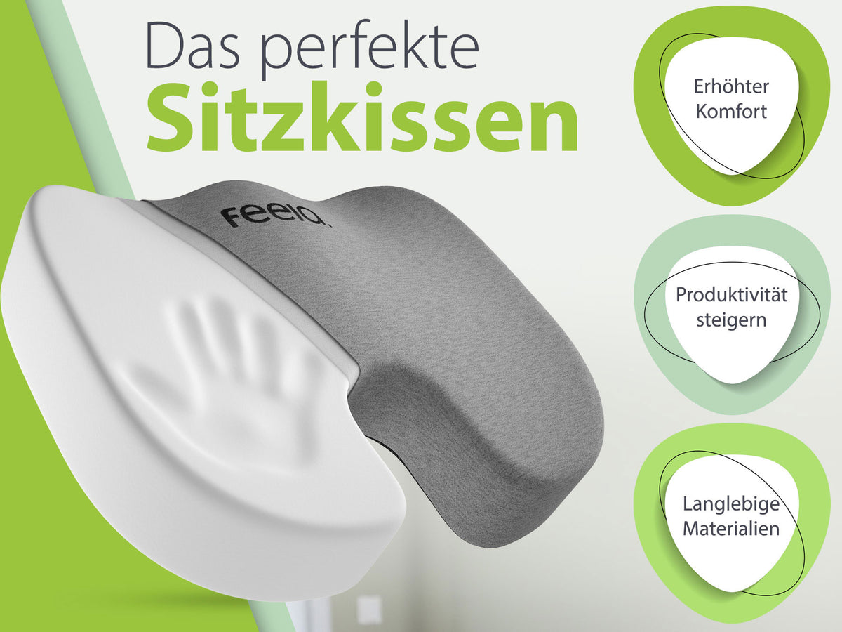 Das orthopädische Sitzkissen von feela in Dunkelgrau, präsentiert als das perfekte Sitzkissen, das erhöhten Komfort und Produktivität fördert, sowie aus langlebigen Materialien besteht.