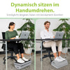 Ergonomische Fußstütze mit Wärmetasche, graues Trittpolster unter stehenden Schuhen