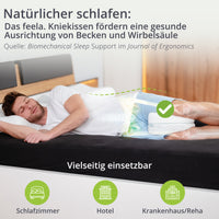 Weißes Kniekissen als Auflage unter dem Knie, für seitliche Schlafposition